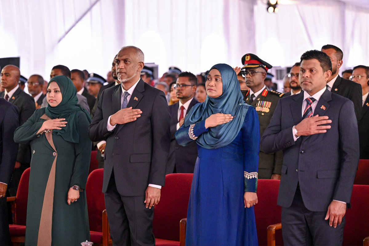 presidencymv's tweet photo. President Dr @MMuizzu and First Lady @sajidhaamohamed attend the official National Day ceremony in HA. Utheemu, joining the nation in commemorating its history, independence and enduring national spirit.

#Qaumeedhuvas1448 
#RayyithunGaathah 
#UtheemuVisit https://t.co/5705uVFMwR