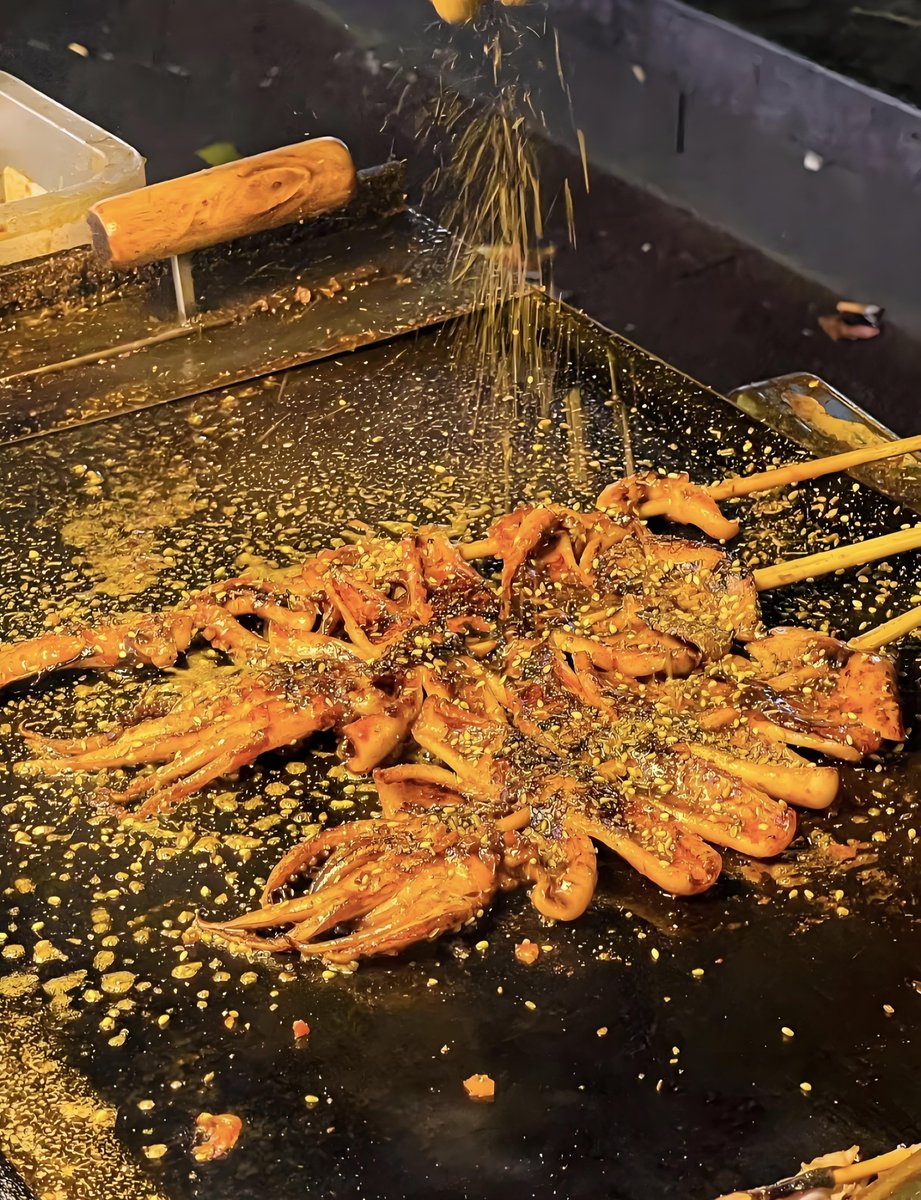 Patrick88704205's tweet photo. Tasty crispy fried squid skewers from the night market! Perfect street snack for a cool evening walk. https://t.co/azltsOXEjG