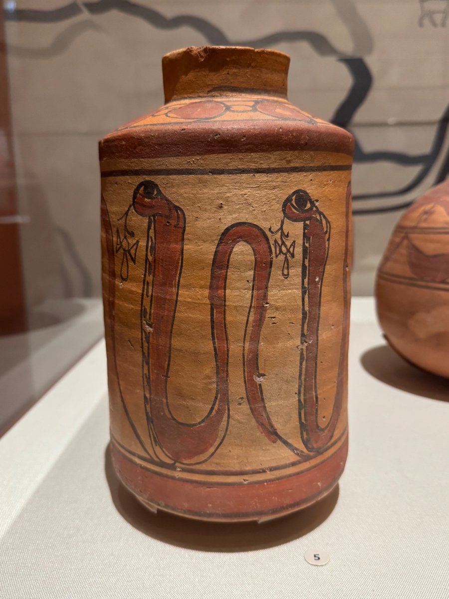 HellenisticPod's tweet photo. A clay pot from Meroitic Nubia, with scenes showing a procession of cobras spitting ankhs. 

The cobra in some mythological traditions was Sekhmet transformed, and was associated in Egypt and Meroë with the king

📸 @ISAC_UChicago (8/2026) https://t.co/uJpUxlHInq