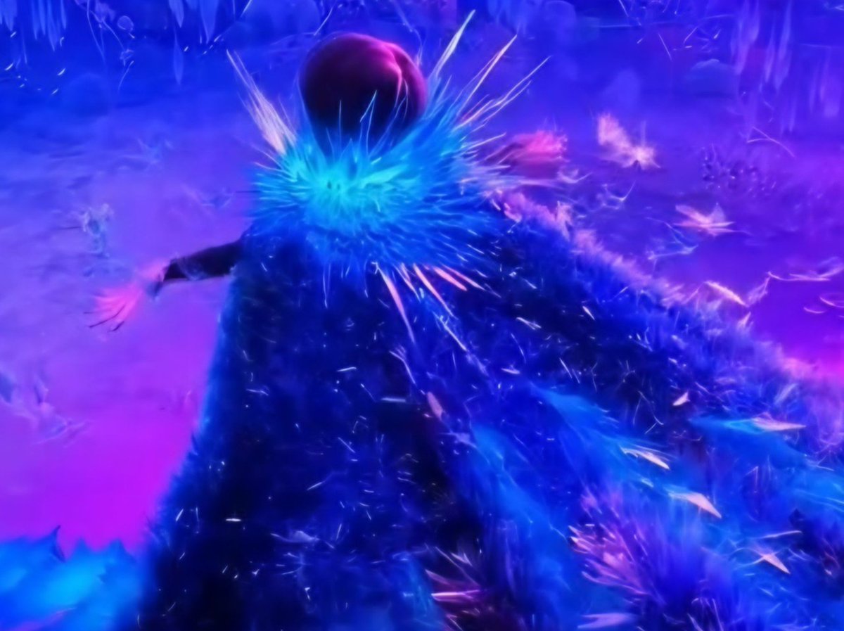 nicudys's tweet photo. I examined the new villain's costume in the Frozen 3 trailer and caught a few details. Her shoes have ice butterfly patterns on the sides, and I saw ice around her neck, though I couldn't quite make it out. Her short black hair reminds me of Elsa's old villain concept art! https://t.co/jutM93t81L
