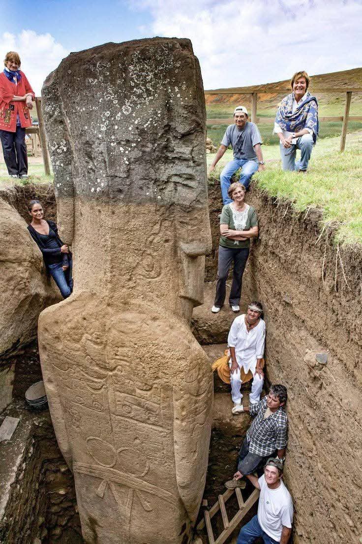 UnearthedHQ's tweet photo. 🗿 This Was Buried for Thousands of Years

This massive stone figure was uncovered inside a carefully dug archaeological trench. Carved from a single block of stone, it has a human shape, simple facial features, and symbols cut into its surface. Archaeologists believe it dates back to the Neolithic or early Bronze Age — a time when people had no metal tools, no writing, and no modern machines.

The people standing beside it show how large it really is — and how deliberate its creation must have been. This wasn’t random. Someone planned it, shaped it, and placed it here thousands of years ago, during a time when stone tools were the only technology available.

Images like this stop us mid-scroll because they touch something deep. Across the world — from Göbekli Tepe to Easter Island — different cultures shared the same urge: to leave a mark that would outlast them. This statue is not just ancient art; it is a message sent through time. It whispers of belief, identity, and the timeless human need to be remembered. In its silent stone gaze, we see both our past… and ourselves.

Some things aren’t lost to time.
They’re hidden.