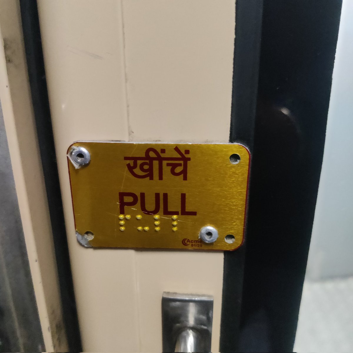 Veeresh_Handi's tweet photo. Traveling on the 16535 Gol Gumbaz Express (3AC). Sitting on the last seat right next to the door is a constant disturbance! The door instruction plates only have Hindi, English, &amp; Braille with zero Kannada. Passengers constantly push instead of pull @SWRRLY Bengaluru@RailwaySeva https://t.co/ZqIb61zJOp