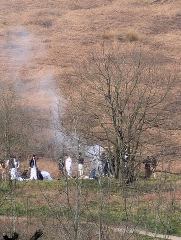 Neccccy's tweet photo. Muslim migrants setting fires in fields as we speak !!

What are you going to do with them Burnham? https://t.co/RI6TTOP3bR