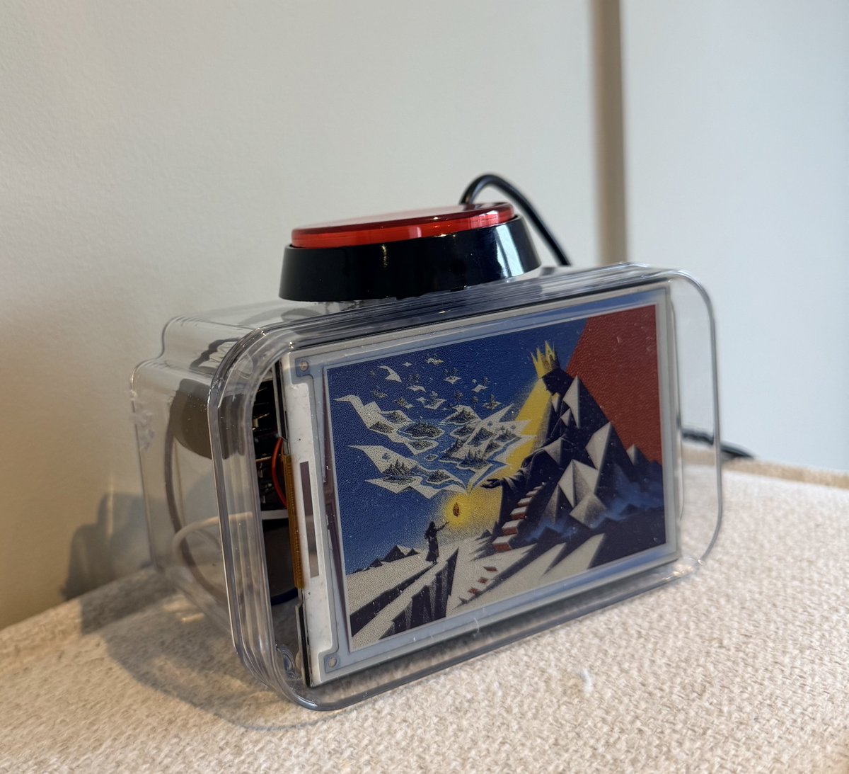 oblomovius's tweet photo. I built a physical dream machine for my wife. She always wants to capture her dreams when she wakes up. The device captures the dream, illustrates it beautifully and sends a postcard to a private website. I used a spare @Raspberry_Pi and planned it out using @tryblueprint_io. @OpenAI Codex helped me with the software. You can literally just build things even as a non technical person. The future is electric. She absolutely loves it even though I destroyed her food storage box for the case.