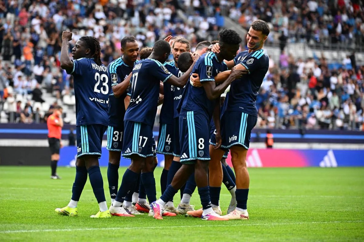 NextFootyStars's tweet photo. 🏟️ POST-MATCH REPORT

Fixture: Paris FC vs Nice
Comp: Ligue 1 | Round: 2
Final Score: Paris FC 3 - 0 Nice (FT)
Date: August 30, 2026 | Venue: Stade Jean Bouin, Paris | Att: 18,240
Referee: Jeremy Stinat (France)
Valuation: Paris FC (€57.4m) vs Nice (€46.2m) | Delta: €11.2m (Paris FC)

📈 STATISTICAL DASHBOARD

Paris FC (🔵) vs Nice (🔴)

[TERRITORIAL CONTROL & THREAT]
• Ball Possession: 45% vs 55% 🔴
• Field Tilt (Final 3rd Share): 42% vs 58% 🔴
• Expected Goals (xG): 2.89 vs 0.65 🔵
• xG Split [Open/Set]: (1.86 / 1.03) vs (0.53 / 0.13) 🔵
• Expected Goals on Target (xGOT): 2.55 vs 0.38 🔵
• Big Chances [Created/Missed]: (5/2) vs (0/0) 🔵
• Total Shots [Total (On Target)]: 15(4) vs 15(4) 🤝
• Shots Location [Inside/Outside Box]: (10/5) vs (9/6) 🔵
• Touches in Opposition Box: 24 vs 24 🤝
• Attacking Channels [L/C/R]: (29%/38%/33%) vs (25%/23%/52%)

[PROGRESSION & DISTRIBUTION]
• Passing [Acc/Tot]: 521/585 (89%) vs 619/693 (89%) 🔴
• Long Balls [Acc/Att]: 15/35 (43%) vs 23/47 (49%) 🔴
• Crosses [Acc/Att]: 2/8 (25%) vs 6/22 (27%) 🔴
• Dribbles [Won/Att]: 7/19 (37%) vs 9/18 (50%) 🔴

[DUELS & DEFENSIVE RESISTANCE]
• Ground Duels [Won/Tot]: 28/61 (46%) vs 33/61 (54%) 🔴
• Aerial Duels [Won/Tot]: 3/13 (23%) vs 10/13 (77%) 🔴
• Box Resistance [Clearances/Blocks]: (24/6) vs (11/4) 🔵
• Defensive Interventions [Tackles/Int]: (15/14) vs (17/16) 🔴
• Micro-Turnovers [Dispossessed/Bad Touches]: (5/12) vs (6/17) 🔵
• Fouls Committed: 7 vs 7 🤝
• Discipline [YC/RC]: (0/0) vs (1/0) 🔵

[PROGRESSION TOPOLOGY & PASS NETWORKS]
-> 🔵 Primary Progression Hub: Maxime Lopez (114T | 8 into F3) | Pivot Anchor: Pierre Lees-Melou
-> 🔵 Key Progression Dyads: Maxime Lopez ➔ Pierre Lees-Melou (19) | Diego Coppola ➔ Maxime Lopez (17) | Samir Chergui ➔ Maxime Lopez (14)
-> 🔴 Primary Progression Hub: Gauthier Hein (84T | 12 into F3) | Pivot Anchor: Youssouf Ndayishimiye
-> 🔴 Key Progression Dyads: Youssouf Ndayishimiye ➔ Mohamed Abdelmonem (28) | Youssouf Ndayishimiye ➔ Xavier Mandza (25) | Mohamed Abdelmonem ➔ Jonathan Clauss (22)

[PERIOD SPLITS]
-> 1H: Score: 1-0 | xG: 0.95 vs 0.24 (OP: 0.16 vs 0.24) | Poss: 49% vs 51%
-> 2H: Score: 2-0 | xG: 1.93 vs 0.41 (OP: 1.70 vs 0.29) | Poss: 41% vs 59%

👤 PLAYER PERFORMANCE & IMPACT

PLAYER OF THE MATCH
-> Pierre Lees-Melou (Paris FC) - 8.5/10 🌟 | DMC | 90m
   Stat: 14 Defensive Actions | 8 Tackles Won (100%) | 10/11 Duels Won (91%) | 78/82 Accurate Passes (95%) | 3 Interceptions | 8 Recoveries
   Impact: Delivered an absolute structural clinic in midfield screening, completely dismantling Nice inside channel progressions through anticipatory interceptions and clean ground duel execution. Maintained flawless passing continuity under pressure while acting as the primary launchpad for vertical transition sequences.

🔵 PARIS FC — PERFORMANCE PROFILE

Top 3 Performers (Excl. POTM):

-> Ilan Kebbal (#10, AMR) - 8.4/10 🔥 | 83m
   Stat: 1 Assist | 4 Chances Created (2 Big Chances) | 1 Penalty Won | 7 Touches in Opp Box | 3/7 Dribbles Completed
   Impact: Terrorized Nice left flank with sharp half-space manipulation, directly drawing the first-half penalty before providing the pinpoint square assist for Chergui second goal.

-> Lassine Sinayoko (#9, FW) - 8.1/10 🔥 | 90m
   Stat: 1 Goal (Pen) | 5 Total Shots | 3 Chances Created | 6 Touches in Opp Box | 2 Interceptions
   Impact: Led the frontline with relentless physical running, coolly converting the opening penalty and relentlessly pressing Nice back three into catastrophic second-phase errors.

-> Samir Chergui (#31, DC) - 8.1/10 🔥 | 90m
   Stat: 1 Goal | 4 Clearances (3 Headed) | 2 Interceptions | 1 Shot Block | 48/53 Accurate Passes (91%)
   Impact: Neutralized central box entries with dominant aerial clearances while aggressively exploiting an offensive turnover to score Paris FC second goal from open play.

Structural Bottlenecks:

-> Moses Simon (#27, AML) - 6.6/10 🟡 | 63m | Defect: 0/2 Dribbles Won | 0/5 Crosses Completed | 0/4 Total Duels Won
   Impact: Struggled to create separation against Abdelmonem and Clauss down the left flank, frequently isolated from deep circulation before being hooked at the hour mark.

🔴 NICE — PERFORMANCE PROFILE

Top 3 Performers (Excl. POTM):

-> Xavier Mandza (#35, DC) - 7.4/10 🟢 | 90m
   Stat: 89/95 Accurate Passes (94%) | 8 Defensive Actions | 14 Recoveries | 3 Tackles | 5/7 Duels Won | 3 Total Shots
   Impact: Stood out as Nice most composed defender in possession, executing clean cross-field switches and stepping into midfield to break up intermediate Paris FC breaks.

-> Axel Witsel (#28, MC) - 7.4/10 🟢 | 73m
   Stat: 40/43 Accurate Passes (93%) | 4 Interceptions | 7 Recoveries | 2/2 Dribbles Completed | 1 Chance Created
   Impact: Maintained central structural stability and ball retention in the first half, preventing central fractures until tactical substitutions compromised defensive coverage.

-> Mohamed Abdelmonem (#5, DC) - 7.3/10 🟢 | 73m
   Stat: 75/79 Accurate Passes (95%) | 4/4 Tackles Won | 5/5 Ground Duels Won (100%) | 4/4 Long Balls | 8 Passes into F3
   Impact: Locked down his defensive duels on the right side of the back three and distributed effectively into Clauss before departing in a double substitution.

Structural Bottlenecks:

-> Antoine Mendy (#33, DC/Sub) - 5.3/10 🔻 | 17m | Defect: 2 Critical Errors (1 Error Leading to Goal, 1 Error Leading to Shot)
   Impact: Endured a catastrophic cameo off the bench, gifting Patrick Zabi a clean breakaway at minute 86 before turning the ball over directly inside his defensive box to concede the third goal at minute 89.

-> Nathan Ngoumou (#29, FW) - 5.8/10 🔻 | 63m | Defect: 0 Shots On Target (2 Off Target) | 4 Accurate Passes in 63m | 0 Chances Created
   Impact: Completely neutralized by Coppola and Chergui in central channels, failing to hold up play or offer vertical threat behind Paris FC mid-block.

-> Yéhvann Diouf (#23, GK) - 5.9/10 🔻 | 90m | Defect: 3 Goals Conceded from 4 SOT Faced | -0.45 Goals Prevented
   Impact: Beaten on three high-leverage opportunities without producing an acrobatic intervention, unable to bail out his backline during catastrophic second-half defensive breakdowns.

⏱️ KEY TURNING POINTS

Critical Match Turning Points:

-> Min 21: ⚽ Goal - Lassine Sinayoko (Paris FC)
   Spatial & Game-State Dynamics: Score: 0-0 | Momentum: +73 Paris FC | Distance ~11.0m | xG: 0.79 | xGOT: 0.60. After Ilan Kebbal drew a reckless sliding foul from Youssouf Ndayishimiye inside the penalty area at minute 18, Sinayoko stepped up to slot a low right-footed strike into the bottom left corner, completely shifting match momentum toward the hosts.

-> Min 51: ⚽ Goal - Samir Chergui (Paris FC)
   Spatial & Game-State Dynamics: Score: 1-0 | Momentum: +100 Paris FC | Distance ~10.6m | xG: 0.13 | xGOT: 0.20. Melvin Bard committed an unforced micro-turnover in build-up under pressing pressure from Kebbal, who collected the loose ball and threaded an unselfish cross-box pass to central defender Chergui to finish low into the bottom right corner.

-> Min 86: ❌ Big Chance Missed - Patrick Zabi (Paris FC)
   Spatial & Game-State Dynamics: Score: 2-0 | Momentum: +22 Paris FC | Distance ~14.2m | xG: 0.62 | xGOT: 0.00. Antoine Mendy misjudged a lateral ball across the defensive third, allowing substitute Zabi to intercept and drive through clean on a 1v1 breakaway against Diouf, only to drag his right-footed effort agonisingly wide of the left post.

-> Min 89: ⚽ Goal - Vincent Marchetti (Paris FC)
   Spatial & Game-State Dynamics: Score: 2-0 | Momentum: +100 Paris FC | Distance ~13.7m | xG: 0.26 | xGOT: 0.85. Another catastrophic backline error by Mendy on the edge of his own box allowed Sinayoko to recover possession and feed Zabi, who laid off a square ball for Marchetti to sweep a crisp left-footed strike into the bottom right corner, sealing the 3-0 scoreline.

📐 TACTICAL BREAKDOWN & MATCH DYNAMICS

Managerial Battle & Geometric Shapes:
🔵 Liam Rosenior: 4-2-3-1 | IP: 3-2-4-1 | OOP: 4-4-2
🔴 Olivier Pantaloni: 3-4-2-1 | IP: 3-1-5-1 | OOP: 5-4-1

• 🧱 Pillar 1: First-Phase Build-Up vs Pressing Confrontation
-> 🔵 Paris FC In-Possession Build-Up Structure: Liam Rosenior deployed a flexible 3-2 progression base where left-back Otávio tucked alongside Diego Coppola and Samir Chergui, enabling double-pivot anchors Pierre Lees-Melou and Maxime Lopez to dictate circulation through constant central combinations (Maxime Lopez ➔ Pierre Lees-Melou [19 passes]). Full-back Adama Camara pushed into the midfield line to offer a wide escape route when Nice closed down the central lanes.
-> 🔴 Nice Out-of-Possession Pressing Geometry: Olivier Pantaloni set up in a 5-4-1 mid-block, deploying Nathan Ngoumou as the lone central presser while attacking midfielders Gauthier Hein and Sofiane Diop tracked lateral pivot movements. However, Nice pressing triggers lacked intensity, allowing Paris FC central defenders to bypass the first line with crisp intermediate ground balls into Lopez.
-> 🔴 Nice In-Possession Build-Up Structure: Nice built out through a back three of Mohamed Abdelmonem, Youssouf Ndayishimiye, and Xavier Mandza, utilizing Axel Witsel as the sole screening anchor while wing-backs Jonathan Clauss and Melvin Bard pushed high into wide corridors (Mohamed Abdelmonem ➔ Jonathan Clauss [22 passes]). Goalkeeper Yéhvann Diouf acted as an active sweeper-keeper, circulating possession laterally across the 18-yard box.
-> 🔵 Paris FC Out-of-Possession Pressing Geometry: Paris FC adopted a compact 4-4-2 defensive shape where Pablo Pagis joined Lassine Sinayoko on the frontline to shade central passing lanes into Witsel, forcing Nice to funnel 52% of their possession down Clauss right-wing corridor before aggressively springing touchline pressing traps.

• 🎯 Pillar 2: Territorial Warfare, Overload Channels & Box Dynamics
-> 🔵 Paris FC Final-Third Overloads & Box Infiltration: Operating through dynamic right-sided half-space combinations involving Ilan Kebbal, Sinayoko, and overlapping runs from Camara, Paris FC generated high-leverage infiltrations by dragging Nice central defenders out of position (Samir Chergui ➔ Maxime Lopez [14 passes]). Kebbal inverted positioning created decisive overloads between the lines, allowing Paris FC to amass 5 Big Chances from just 45% possession.
-> 🔴 Nice Low-Block Compression & Penalty Box Resistance: When pinned, Nice compressed into a 5-4-1 deep block with Bard and Clauss forming a five-man defensive line, but communication breakdowns in defensive transition led to severe structural gaps. Despite accumulating 11 clearances and 4 blocks, individual errors in defensive third distribution repeatedly compromised Diouf goal area.
-> 🔴 Nice Final-Third Overloads & Box Infiltration: Nice directed the overwhelming majority of their attacking threat through Clauss on the right wing (11 crosses attempted, 4 accurate), seeking aerial targets in Ngoumou and later Elye Wahi. Hein and Diop drifted into the half-spaces to generate 3 chances created each, but central passing vectors into the box were consistently smothered before reaching prime shooting locations.
-> 🔵 Paris FC Low-Block Compression & Penalty Box Resistance: Paris FC central defense executed a masterclass in box occupation, generating 24 clearances (8 headed) and 6 blocked shots. Coppola and Chergui dominated aerial deliveries from Clauss and Hein, while Lees-Melou dropped into the defensive pocket to vacuum up second balls, restricting Nice to an anaemic 0.38 xGOT across 15 total attempts.

• ⚡ Pillar 3: Transition Mechanics, Rest-Defense & In-Game Mutations
-> Dynamic Breakaways & Rest-Defense Organization: Paris FC rest-defense was anchored impeccably by the double pivot of Lees-Melou (8 tackles, 3 interceptions, 8 recoveries) and Lopez (6 recoveries), who provided an impenetrable defensive barrier against Nice central counter-attacks. In contrast, Nice rest-defense collapsed entirely in the second half whenever their wing-backs were caught high upfield, exposing central defenders Mandza and Ndayishimiye to rapid 3v2 transition vectors.
-> In-Game Structural Mutations & Substitution Impact: Pantaloni attempted to inject verticality at minute 63 by introducing Wahi for Ngoumou, followed by Mendy, Jansson, Koutoune, and Morana, but the structural balance deteriorated rapidly as Mendy committed two catastrophic unforced turnovers in his own third. Rosenior countered by mutating into a 5-4-1 low-block at minute 83 with the introductions of Hamari Traoré, Patrick Zabi, and Vincent Marchetti, with Zabi and Marchetti directly manufacturing the decisive third goal on a ruthless counter-press sequence.

• ⚖️ Systemic Tactical Verdict

-> Territorial & Positional Control: While Nice dominated nominal possession (55%) and field tilt (58%), their circulation remained sterile and heavily skewed to isolated wide deliveries on the right flank. Paris FC exhibited superior spatial efficiency, controlling the central axis through Lopez and Lees-Melou while executing clinical transition strikes into the half-spaces.

-> Quality of Threat & Variance: The expected goals differential (2.89 vs 0.65 xG; 2.55 vs 0.38 xGOT) reflects a total disparity in chance quality, with Paris FC generating 5 Big Chances to Nice zero. Kevin Trapp handled Nice four tame on-target efforts with complete composure (+0.38 goals prevented), whereas Nice defensive lapses directly surrendered high-leverage finishes.

-> Strategic Adaptation Takeaway: Liam Rosenior completely outmanoeuvred Olivier Pantaloni by conceding sterile wide possession and punishing Nice fragile rest-defense with surgical counter-attacks. Rosenior bench management was decisive, as substitutes Zabi and Marchetti combined to kill off the contest within minutes of entering the pitch.

⚖️ FINAL VERDICT

Intensity Score: 7.5/10 | Tactical Quality: 8.5/10
Classification: Clinical Transition Clinic Against Sterile Possession Monopolization

Summary: Paris FC delivered a flawless tactical performance anchored by Pierre Lees-Melou midfield dominance and lethal transition execution, punishing catastrophic defensive errors from Nice to secure an emphatic 3-0 victory at Stade Jean Bouin.

#Ligue1 #PFCvOGCN #ParisFC #OGCNice