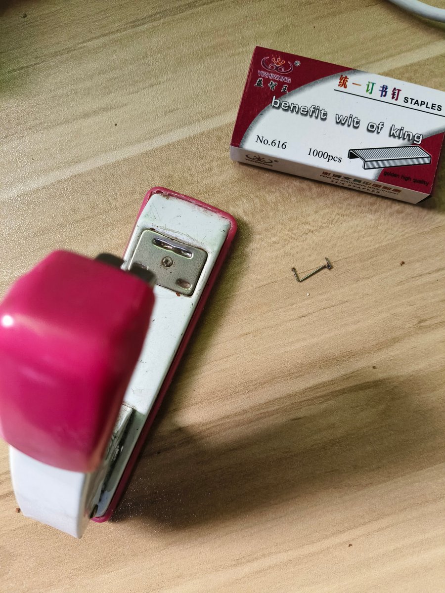lului275578's tweet photo. Caught my intern using the office stapler to fix his broken Pokémon card—now it’s way more durable than his presentation slides. Office hacks hit different. https://t.co/njCk6Udp7i
