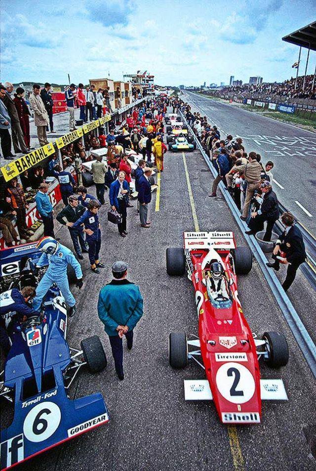 Retromania4ever's tweet photo. 1971 Dutch GP - Pit lane at Circuit 
Zandvoort 🏁
The #Ferrari 312B (№ 2) driven by Jacky Ickx 🇧🇪, won the race. 
The blue #Tyrrell 001/002-Ford (№6) being prepared for François Cevert 🇫🇷 https://t.co/xXd5Io80qW