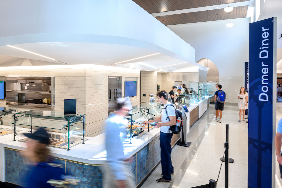 ndmagazine's tweet photo. The serving area of the South Dining Hall is now open. The next year of work will focus on the restoration of the dining rooms and creating a new public entry on the south side of the building. More energy-efficient mechanical, electrical and plumbing systems will be installed. https://t.co/8g7VCdMy6Z