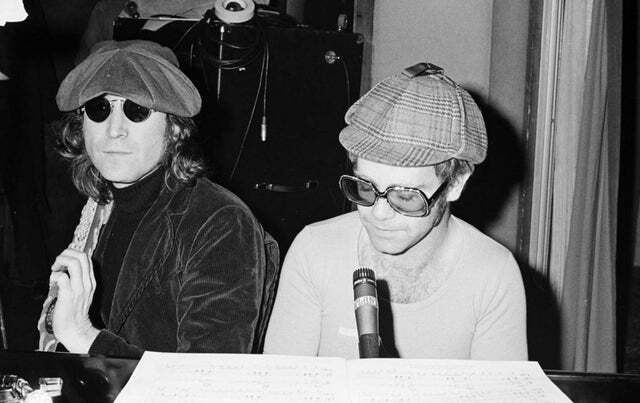 crockpics's tweet photo. John Lennon and Elton John at the piano inside the Record Plant in New York City, July 1974. Photographed by Bob Gruen during the Walls and Bridges sessions, this studio collaboration led to the hit Whatever Gets You thru the Night 

Elton John's cover of The Beatles' Lucy in the Sky with Diamonds featured John Lennon on guitar and backing vocals under the pseudonym Dr. Winston O'Boogie. How does Elton's version compare to the original Sgt. Pepper recording? 👇️