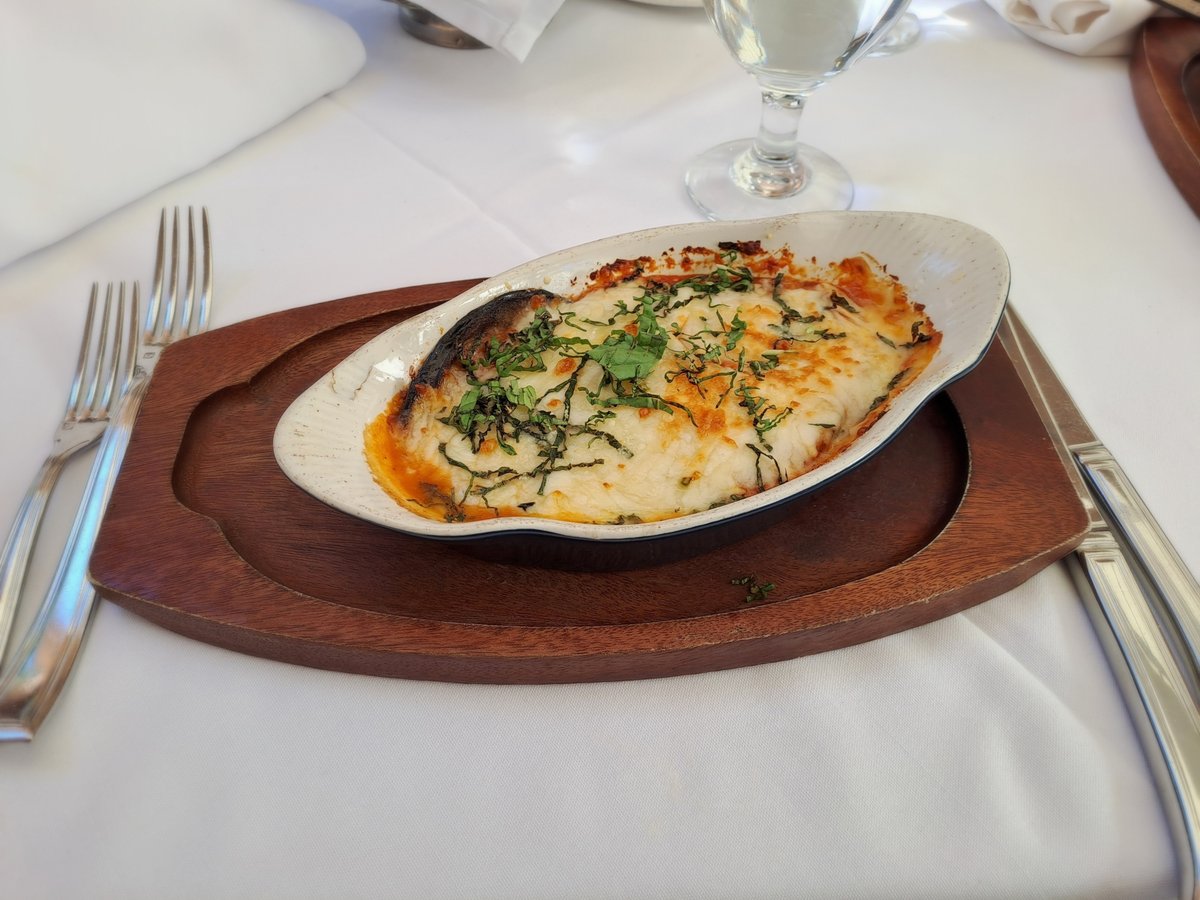 RickWesleymusic's tweet photo. Rick is enjoying the eggplant tortino at "Gianni's At the Former Versace Mansion" in Miami Beach, Florida (USA). 🏨⛲🍴🧒🥂🇺🇸 #rickwesley #richkids #holidays #miamibeach #oceandrive #versacemansion #casacasuarina #gianniversace #giannisatthevilla #florida #usa https://t.co/6MHWmQ9CGW
