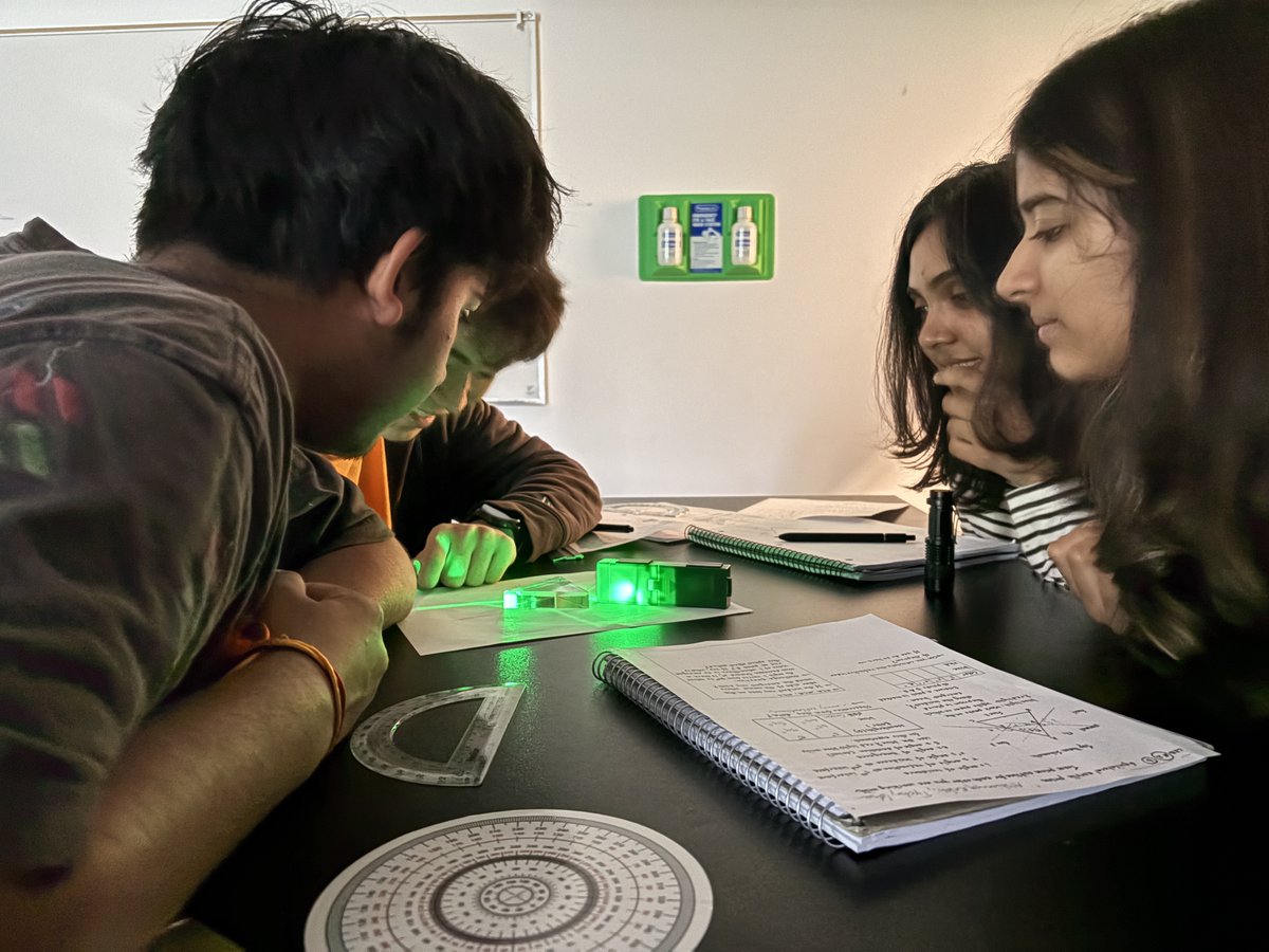 BASISIndFremont's tweet photo. Students in Dr. Dixit's Optics Capstone class explored prisms of different shapes this week, examining how light refracts and reflects at the interface between two different materials — using LED light sources to see the physics in real time! 🔬 #OpticsCapstone #HandsOnScience https://t.co/I2fvY7NUXQ