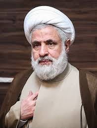 hero_clem's tweet photo. HEZBOLLAH LEADER REJECTS LEBANON–ISRAEL FRAMEWORK, VOWS NOT TO SURRENDER

Hezbollah leader Naim Qassem has publicly rejected the framework agreement signed by the Lebanese government with Israel, describing the deal as “illegitimate, unlawful, humiliating and destructive” to Lebanon’s sovereignty.

Speaking to Hezbollah-affiliated Al-Manar, Qassem said the group rejects the proposed pilot zones and verification mechanisms included in the framework and declared that Hezbollah “will not surrender.”

The agreement, signed in late June under U.S. sponsorship, reportedly includes provisions for Hezbollah’s disarmament, a phased Israeli withdrawal from southern Lebanon, and the deployment of the Lebanese army in areas vacated by Israeli forces.

The rejection comes amid renewed fighting and escalating tensions in southern Lebanon.

More than 4,300 people have reportedly been killed since Hezbollah entered the conflict on March 2, while Israeli forces have carried out several days of strikes on the Ali al-Taher ridge and advanced into villages around Nabatieh.

The next round of talks is expected to take place in early September, although no specific date has yet been announced.

Qassem’s comments now raise serious questions about whether the framework can survive without Hezbollah’s cooperation.

A deal backed by Washington. A Lebanese government that signed it. And Hezbollah now openly calling for its collapse.

Source: AFP, Al-Manar