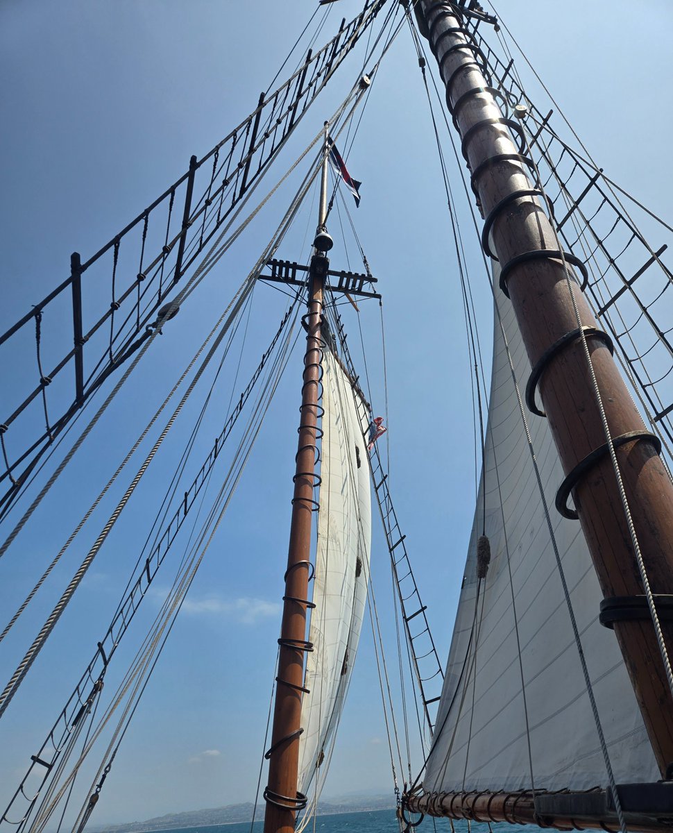 ManMacguffin's tweet photo. @hirotonfa One thing  to add on is schooners (fore and aft rigged ships invented in colonial Massachusetts btw)  are able to sail closer to the eye because they are propelled by lift. Here's a pic of our sails and you can see it resembles a vertical wing. https://t.co/V9g4BTvqlN