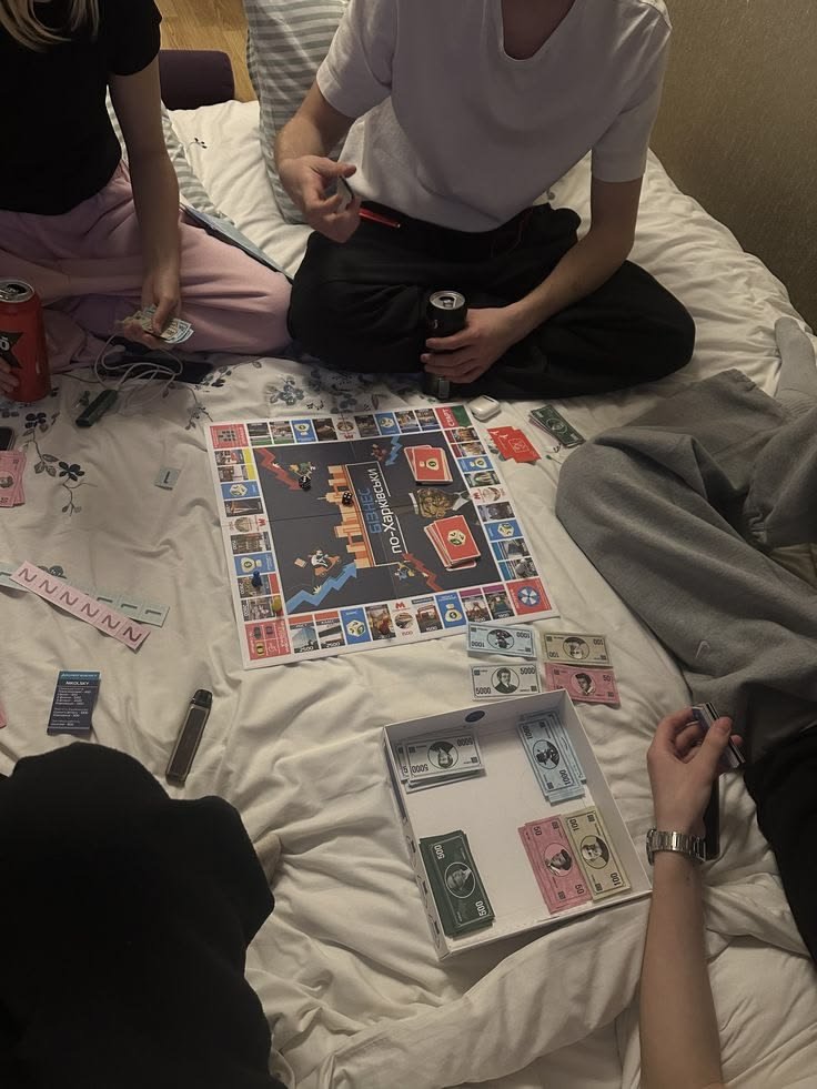 ATLAS_LSJ's tweet photo. So uh. Bandmate found Ukranian Monopoly??????? None of us understand it and I'm pretty sure someone is cheating the house down but its fine this is fine https://t.co/BUUTX85GPb