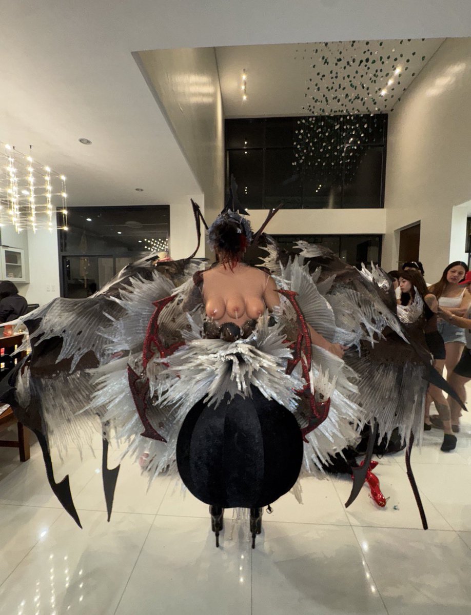 Drag_Crave's tweet photo. M1ss Jade So reveals photos of her original ‘Shock and Awe’ runway for Drag Race Down Under vs. the World, which had to be cut into pieces to fit in her luggage. https://t.co/gx1jtY1aE1