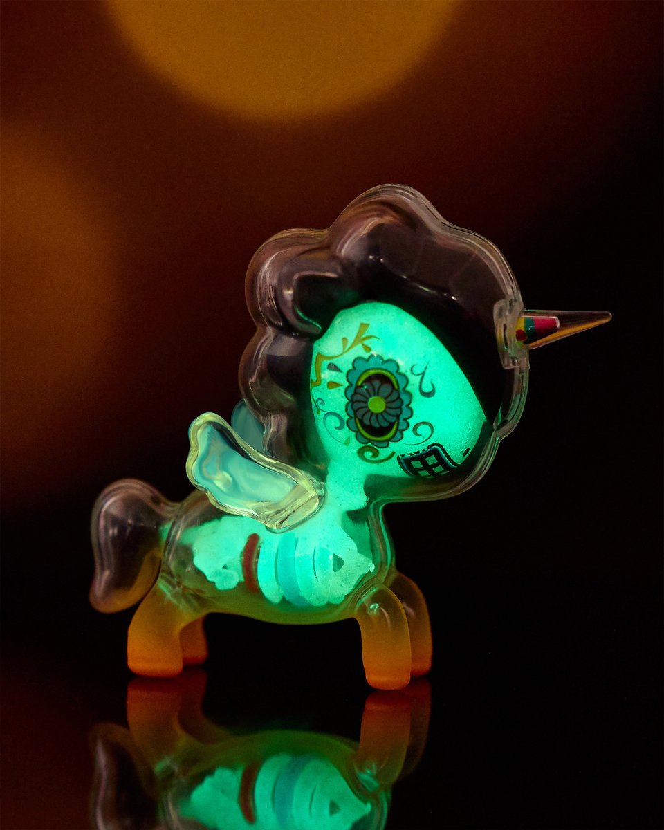 tokidoki's tweet photo. Bone-chilling cuteness is here with Caramelo, the After Dark Skeleton Unicorno Special Edition! 🖤 Swipe to see Caramelo Unicorno ✨glow in the dark✨ after being charged with any source of UV light! https://t.co/A3GO5sZrLk