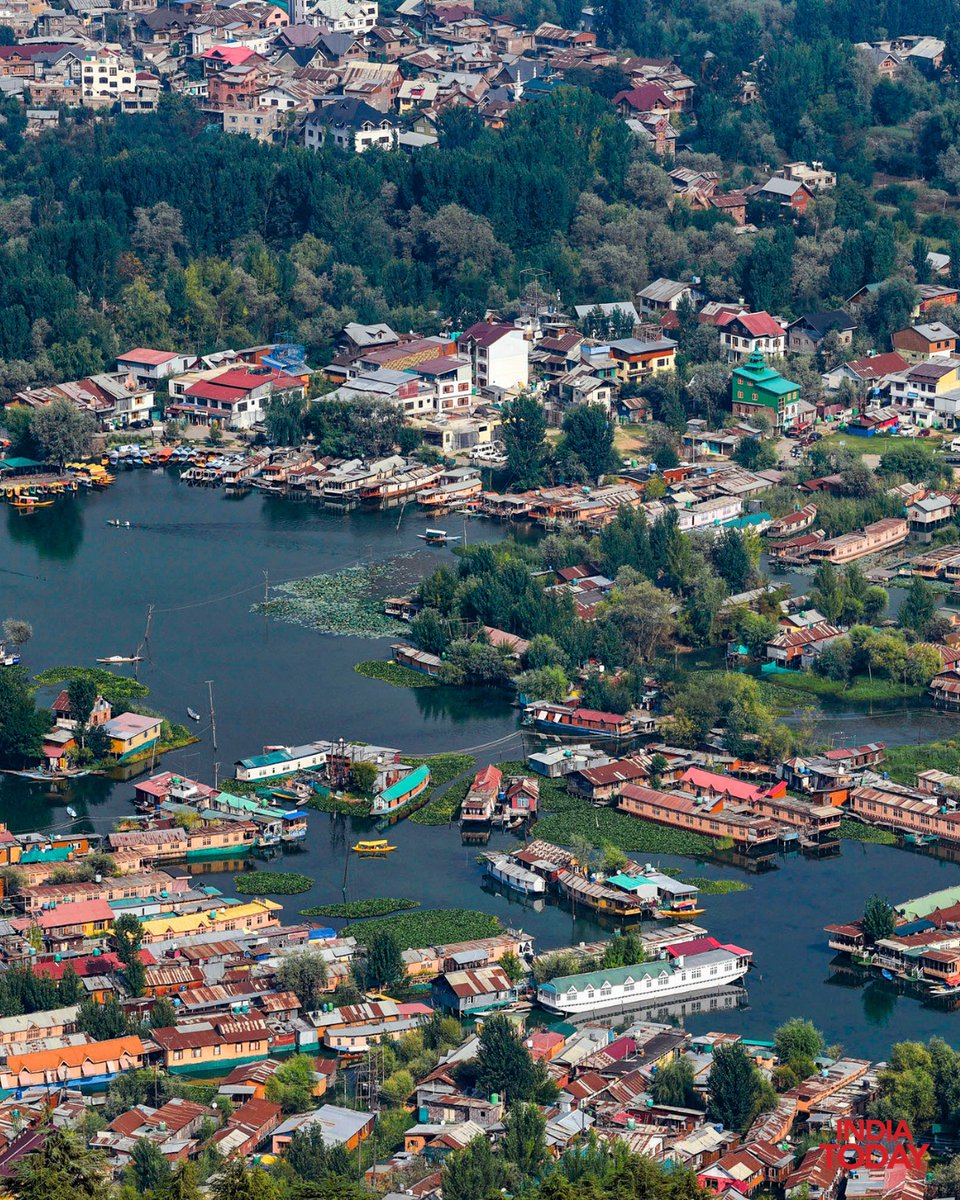 IndiaToday's tweet photo. #InPics | An aerial view captures the iconic houseboats floating on Dal Lake in Srinagar, offering a glimpse of the city’s scenic landscape and Kashmir’s famed waterscape.

#DalLake #Srinagar #Kashmir #Houseboats #ITPhotoBlog https://t.co/d0h8z7XhPP