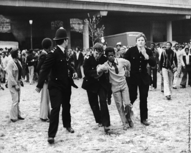 wrkclasshistory's tweet photo. #OtD 30 Aug 1976 riots broke out at the Notting Hill Carnival in London, after carnival-goers, sick of police harassment, attacked officers with stones and other missiles https://t.co/uXuc1w2WZL https://t.co/laytnQBgVL