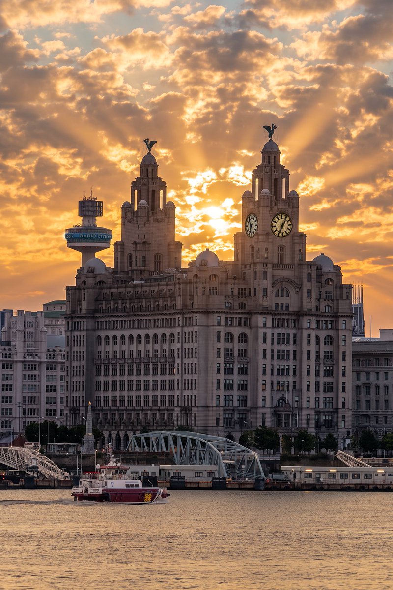 LiverpoolVista's tweet photo. Here comes the sun over Liverpool. https://t.co/Pbj3hLRbGO