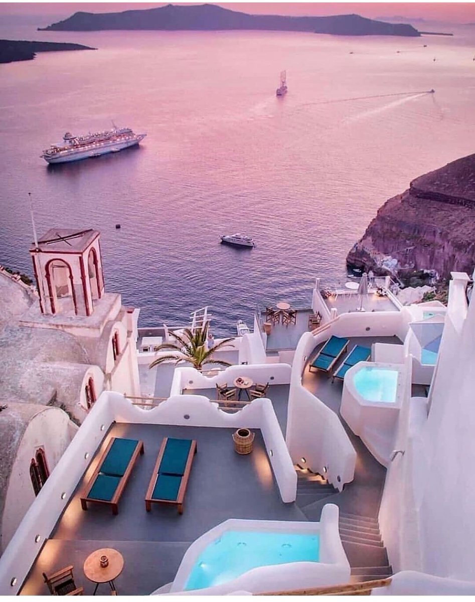 KPack12's tweet photo. Just watched the sunset paint Santorini’s white domes pink and gold, with a cold local wine in hand—this is the kind of slow magic that sticks with you forever. ， https://t.co/Sjj52TvDsQ