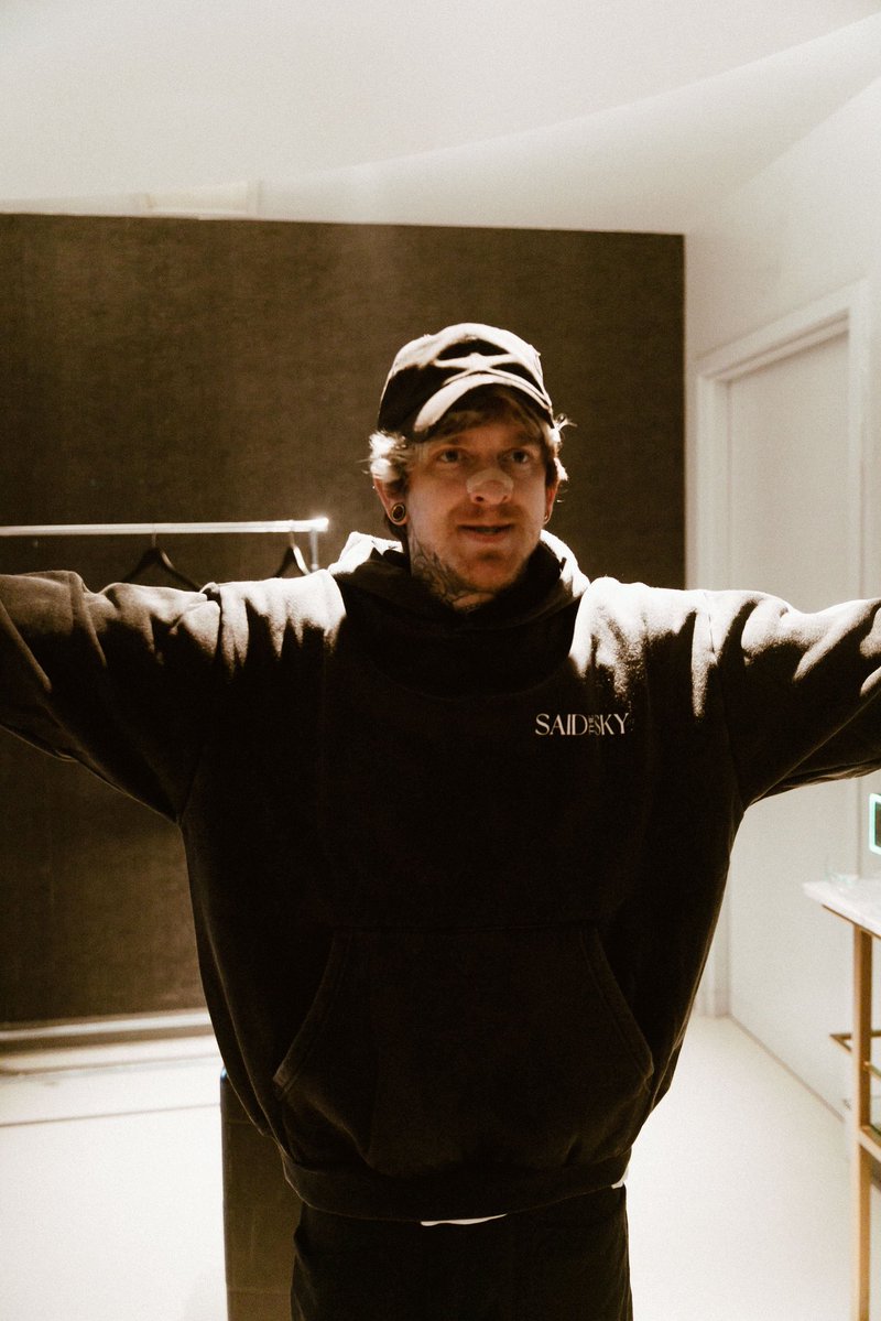 SaidTheSky's tweet photo. WING HOODIE RESTOCK!! Releasing tomorrow (8/19) at 1pm PST. Plus free shipping on my whole store until midnight 💙 

They run a bit small. Here’s me super-modeling an XL (the size I wore all tour)

https://t.co/WovqxvNGRD https://t.co/9ISYBPDUkL