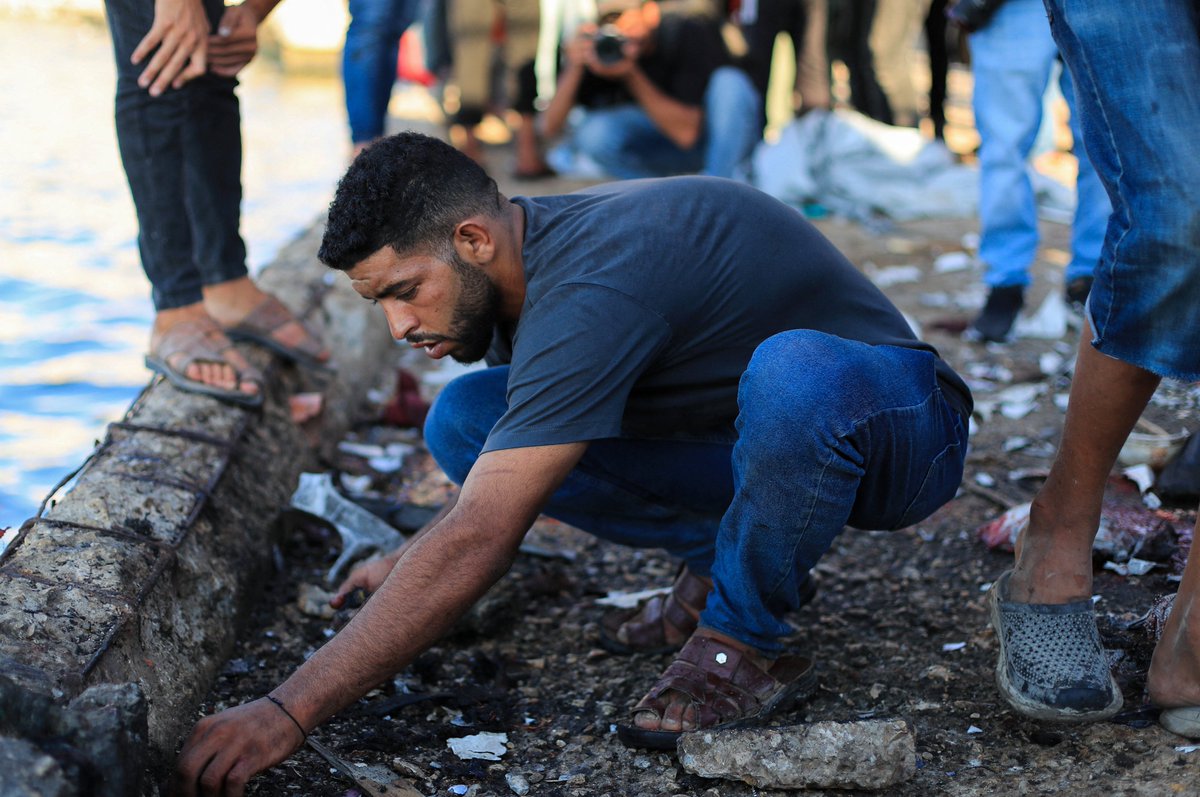 AJENews's tweet photo. Palestinians inspect the site of an Israeli strike on a cafe at the seaport of Gaza City. At least 5 people were killed and dozens wounded.

🔴 More on https://t.co/OwhgaIGyGh https://t.co/9Bx3h6xW1c