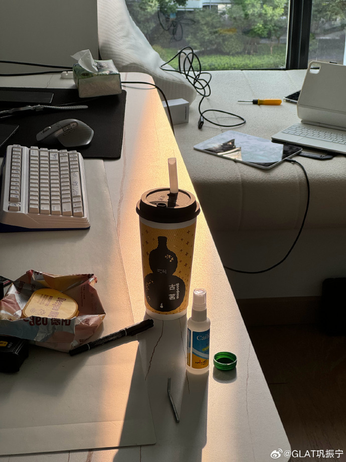 pomuron's tweet photo. Stuck in the office at 8pm, last-minute project update due tomorrow. Cold coffee and snacks are my only sidekicks today. No plans for the evening, just grind till it’s done https://t.co/I6j0Qz7bfo