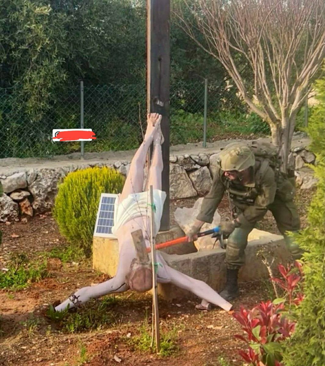 CyberWarim's tweet photo. @MOSSADil Zionist Israeli terrorist Jews are bombing churches, they can't even tolerate statues of Jesus and are barbarically attacking them with axes. https://t.co/CLYTCOtfNM