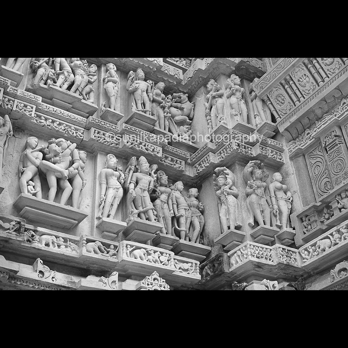 SunilKapadia19's tweet photo. _SSK0213 Artist's Architecture. 
Purchase this Photo Art Print
#blackandwhite #sculptures #statues #deities #celestialbeauties #wall #Hinudtemple #sandstone #niche #carvings #ancient #worldheritagesite #worldtouristdestination #Indianheritagesite #Khajuraho #MadhyaPradesh #India https://t.co/XPNLvfej4j