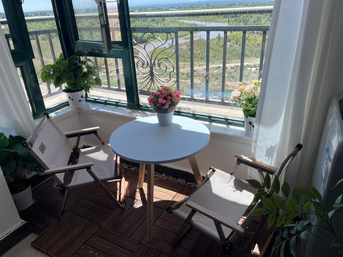 Holly2044701's tweet photo. My tiny balcony has transformed from a useless, cluttered spot into my daily sunrise tea u0026 plant nook—small changes = big joy. https://t.co/LB2tISlAzM