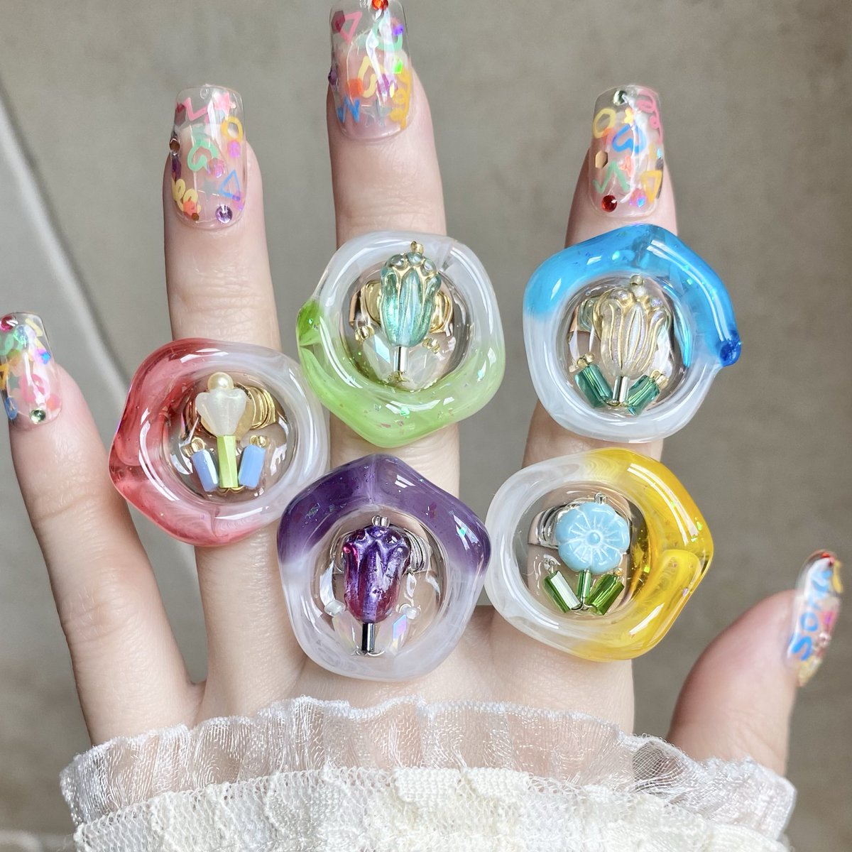 sona_sapinko's tweet photo. 小さな花壇リング🍧🩵✨
次回の販売は２２日（土）２１：００〜
かき氷フレームは今回にて終了予定です
他にも夜空の花火みたいなキラキラフレームがあります🎆 https://t.co/fygMYu9Mgu