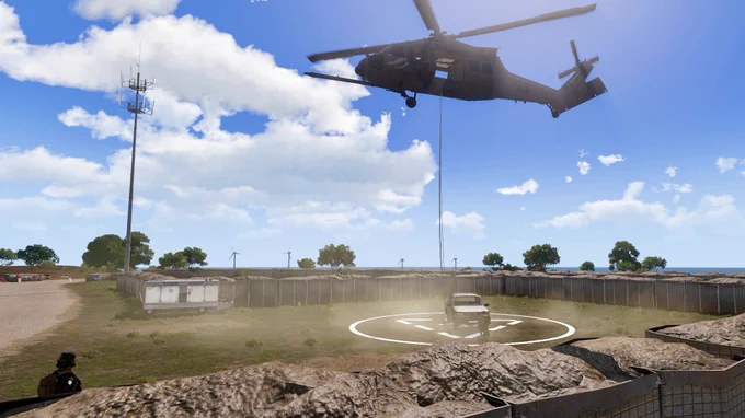 Pave Hawk hebt eine Last per Seil vom Landeplatz ab
