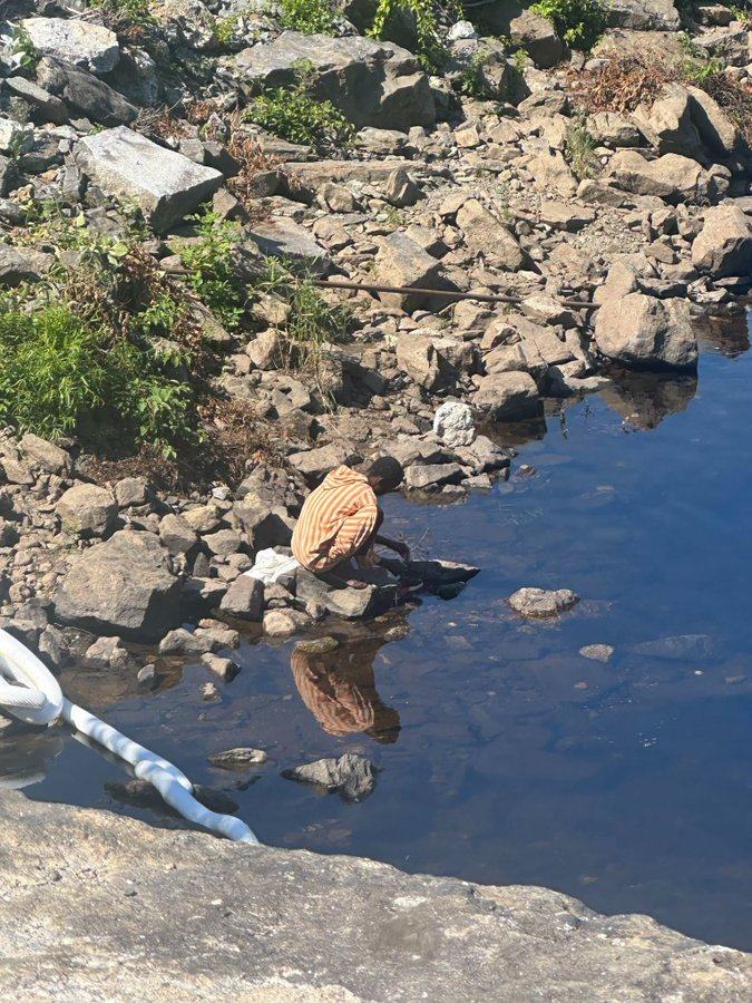 jackunheard's tweet photo. A third-world migrant was just spotted doing his laundry and dumping chemicals into the Androscoggin River in Maine, right at the base of Great Falls.

Why aren't the environment activists freaking out over this? https://t.co/F5HCsegmV9