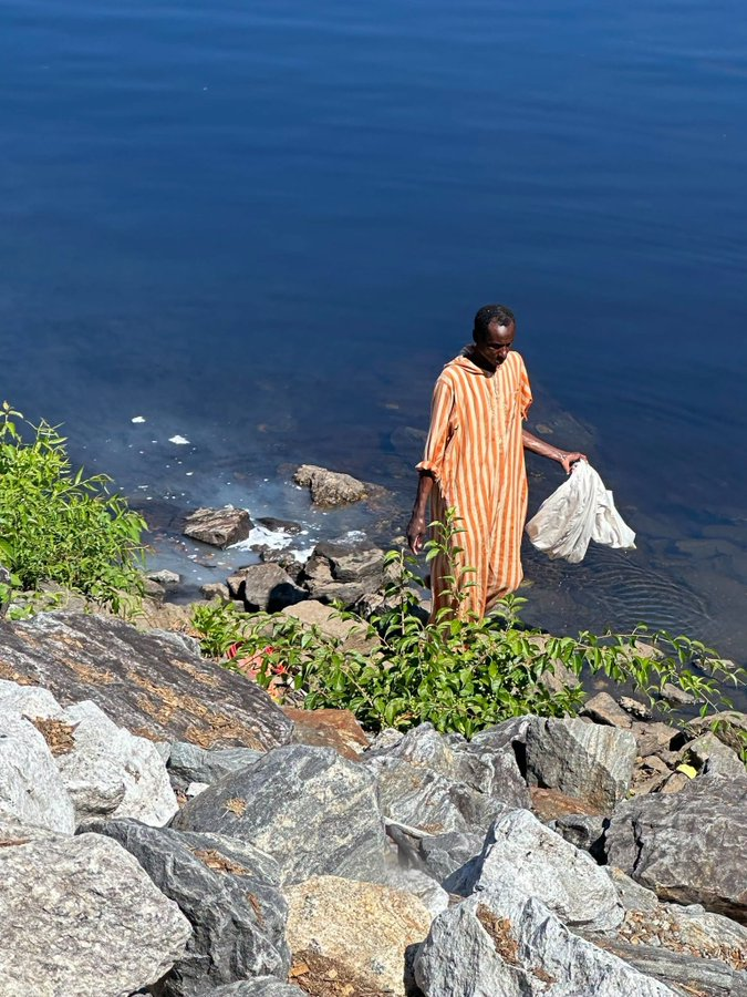 jackunheard's tweet photo. A third-world migrant was just spotted doing his laundry and dumping chemicals into the Androscoggin River in Maine, right at the base of Great Falls.

Why aren't the environment activists freaking out over this? https://t.co/F5HCsegmV9