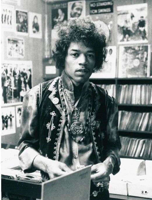 crockpics's tweet photo. Jimi Hendrix browsing for vinyl at The Village Oldies record shop on Bleecker Street in Greenwich Village, New York City, 1968. Dressed in his signature velvet vest, satin shirt, and layered pendants, Hendrix loved digging through the bins for vintage blues, soul, and R&B records whenever he was in town. 

🎸 When you look back at Hendrix’s groundbreaking music, which song features your favorite guitar solo? 🎸 👇️