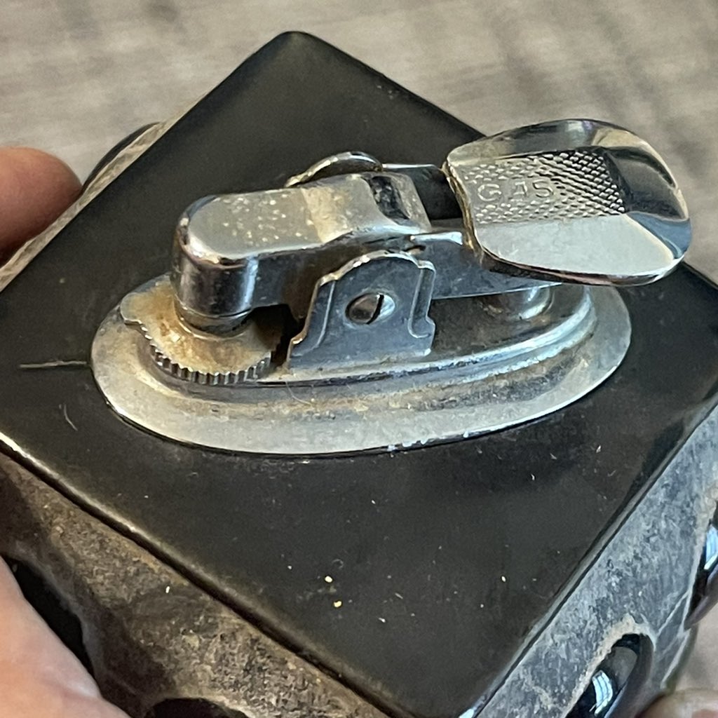 JenX_Based's tweet photo. We need an Xmarketplace for Xmoney. 

I’m a 30 year eBay veteran & I’m just gonna start it kinda here. 

One unique item a day to start. Avoiding 30% fees. 

This one of a kind handmade ceramic with glass marbles, a lighter from the 70s. Needs flint & fuel. Ships within the US for $50. 

You pay in Xmoney & I provide a tracking number through those messages within 24 hours. 

Simple. 

Comment below first. I only have one.