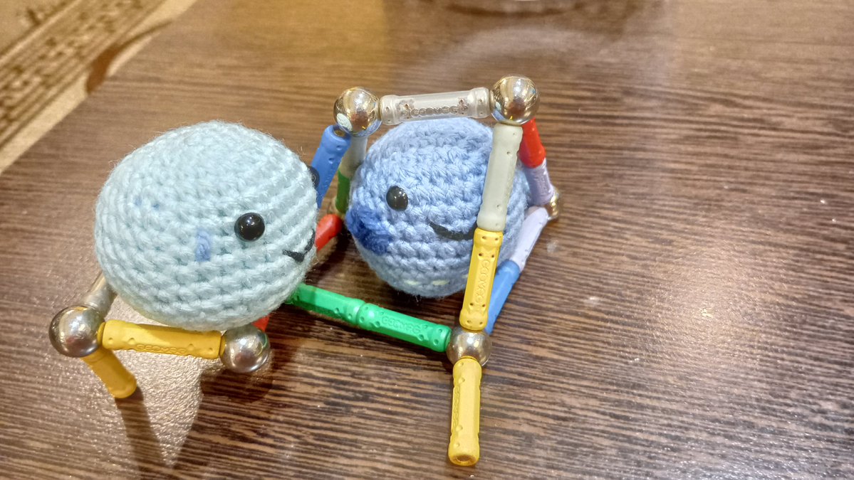 TerminalVeloci5's tweet photo. Crochet Ice Cousins at play! 😉✨

Neptune got himself stuck, Uranus is helping to free his cousin.

#solarballs https://t.co/bx8bdgDmHB