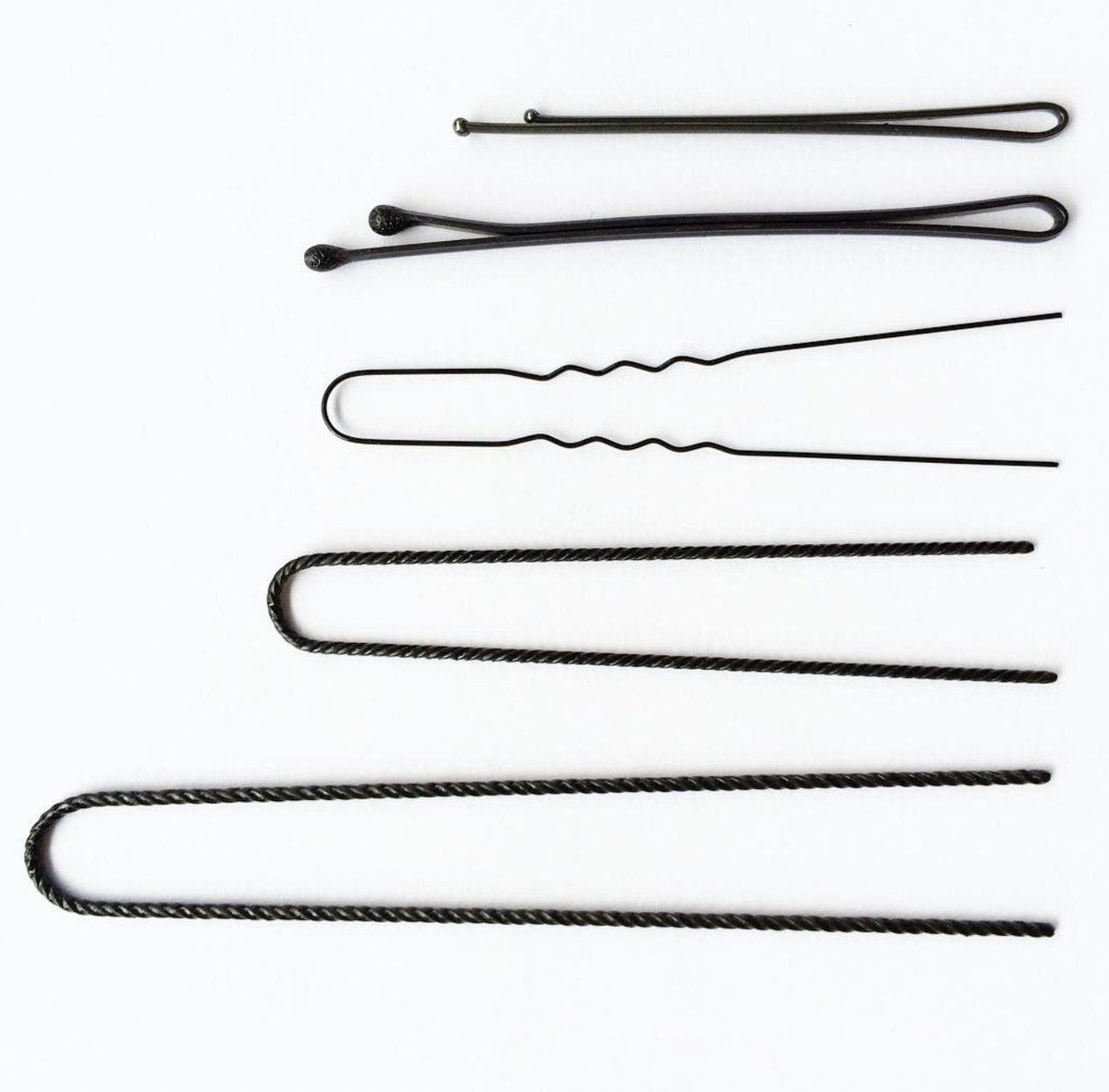 PercyDigian6's tweet photo. Discover Nishida Hair Pins—strong Japanese steel pins for every hair type and style. Available in dispensers or larger boxes. https://t.co/wxf6reILuh