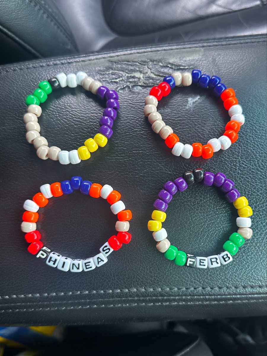 Epic_Emily25's tweet photo. Made all these @PhineasAndFerb Bracelets aren’t they awesome the cuff bracelet took me a long time to do but it’s so cool 🧡💚 @vince_martella @ErrigoVoice https://t.co/uEj3TBKQmV