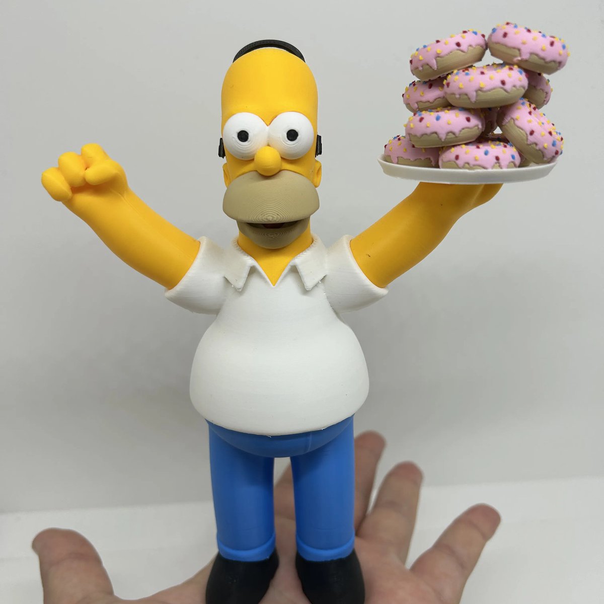yonigudiel's tweet photo. Mmm... donuts... There may be nothing in the world he loves more! Legendary Homer Simpson in his element, ready for a sweet feast. This 3D print radiates pure joy and sugar! More unique figurines available on our profile! https://t.co/Rj2uK466UN