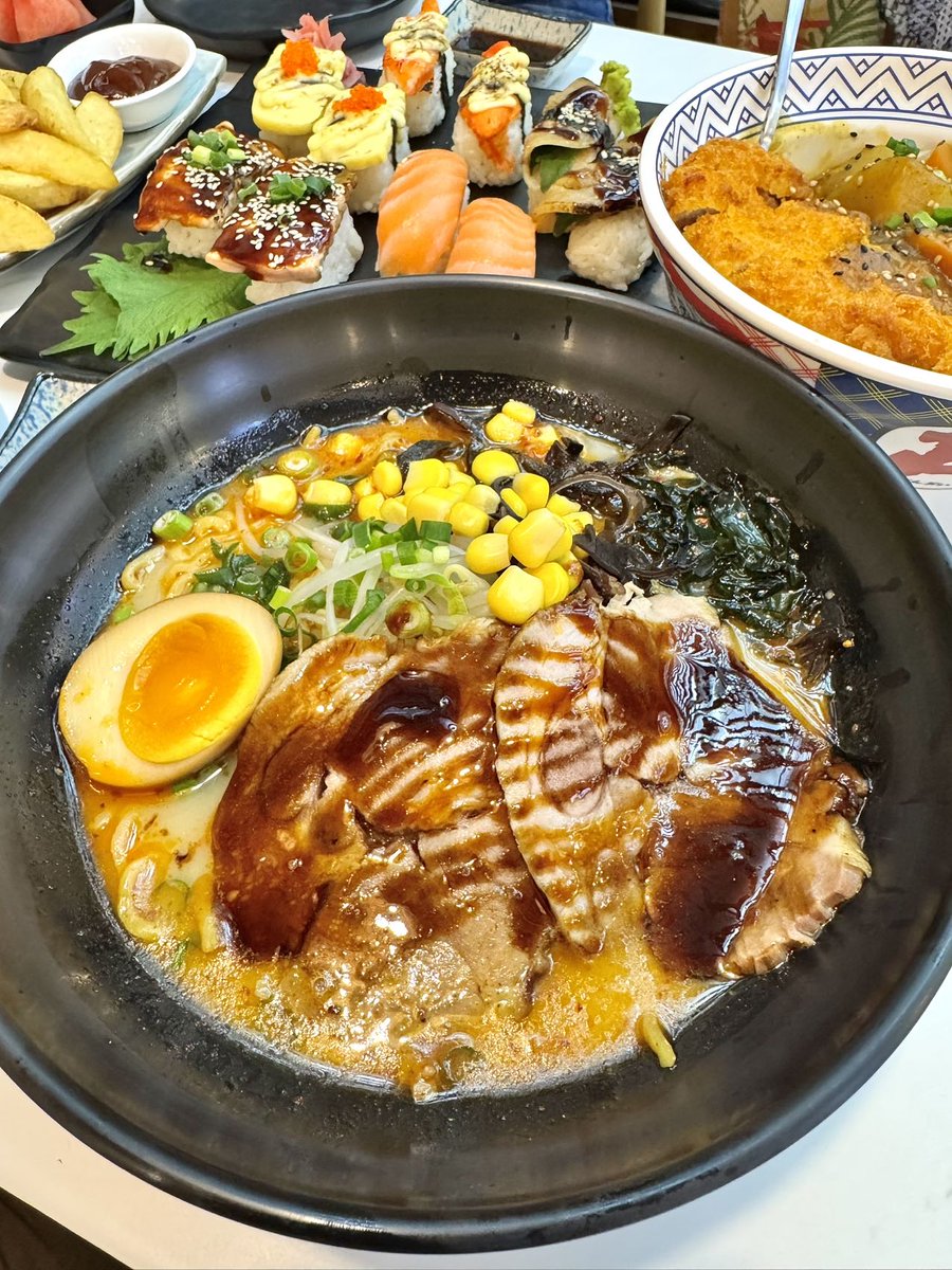Shafeeq84987089's tweet photo. Just found the coziest hole-in-the-wall ramen spot in downtown! Their tonkotsu broth simmers for 12 hours, and the springy noodles paired with soft-boiled ajitsuke egg hit DIFFERENT. 10/10 will be back next week , https://t.co/IWJNLbaO4w