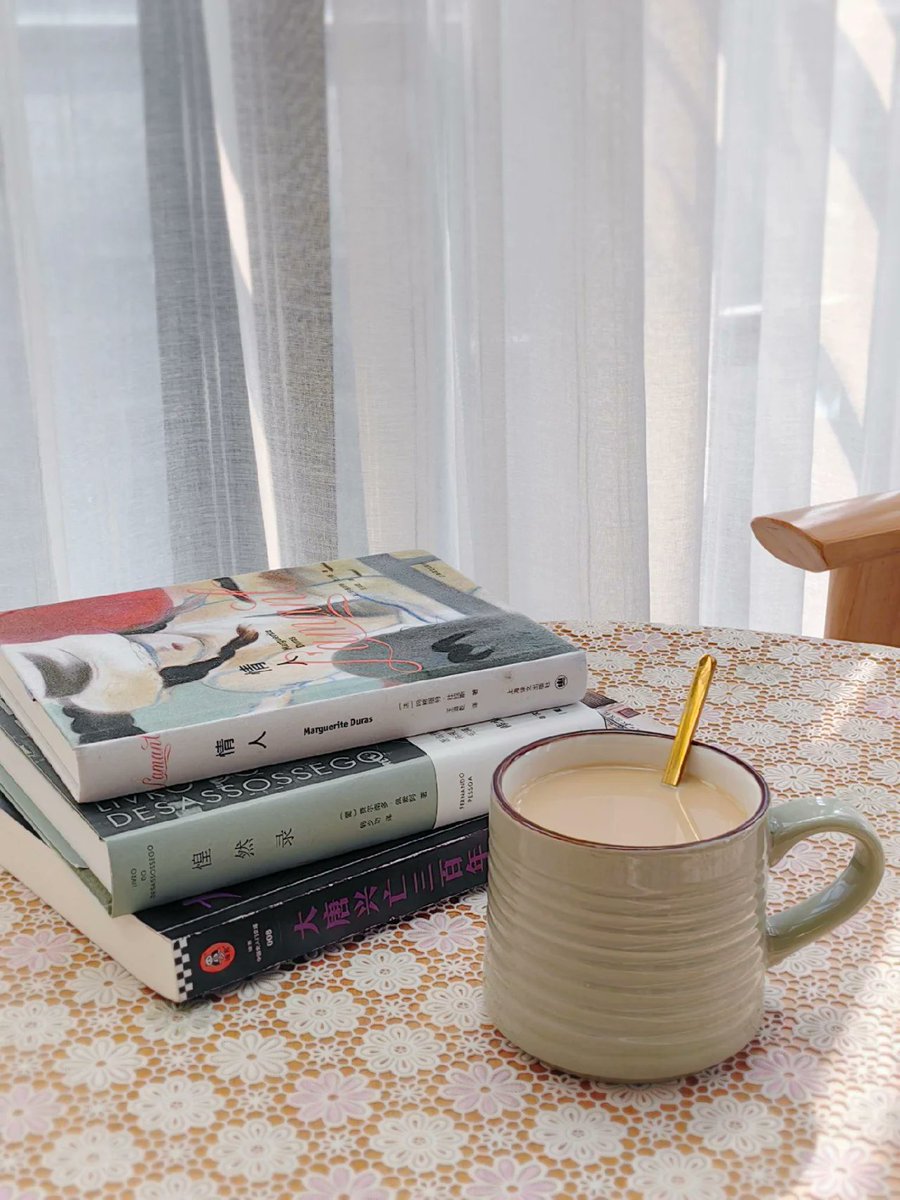 TLashaayy's tweet photo. Just curled up with my favorite novel and a warm latte—perfect little break from the day https://t.co/cmyAOhYED3