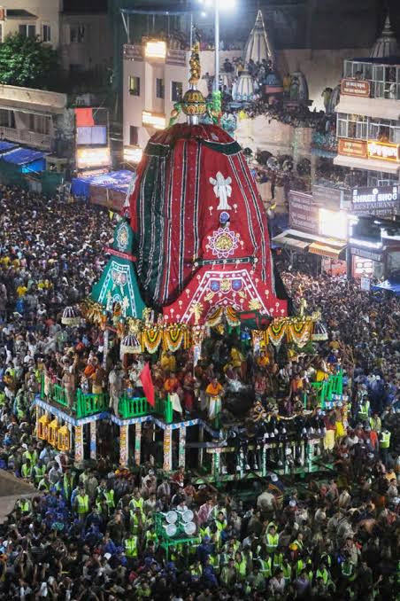 notorious_DaD's tweet photo. @Clint_Davey1 The bottom one looks like a Hindu procession lol. You can be Catholic, that's fine, but the bottom one is a flat out nightmare. https://t.co/VXhXruUfbu
