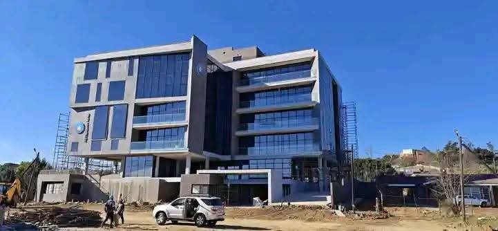 TMofelehetsi's tweet photo. How I wish they had build Petroleum Fund Headquarters next to LCA Headquarters...net for aesthetics and a proper downtown https://t.co/kwXn6B3Yrw