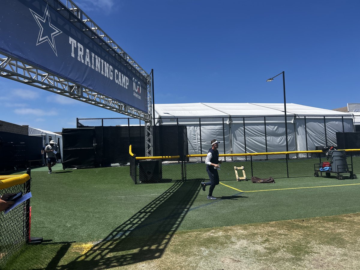 toddarcher's tweet photo. Brian Schottenheimer jogs on to the field for final padded practice in Oxnard. https://t.co/r2atKaUvz8