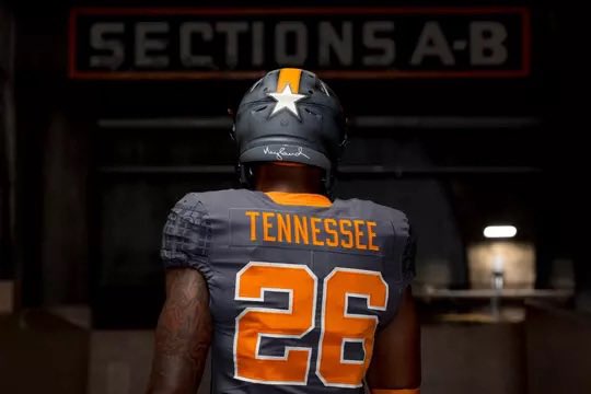 CfieldsVFL's tweet photo. The cleats. The interlocking UT. The incredible paint job on the helmet. The stadium sleeves… it’s just incredible. 
Read the article and full breakdown of all the details. Evan Ford and team did their homework and created a masterpiece. No detail was missed. 
https://t.co/zfNLMqIPUY