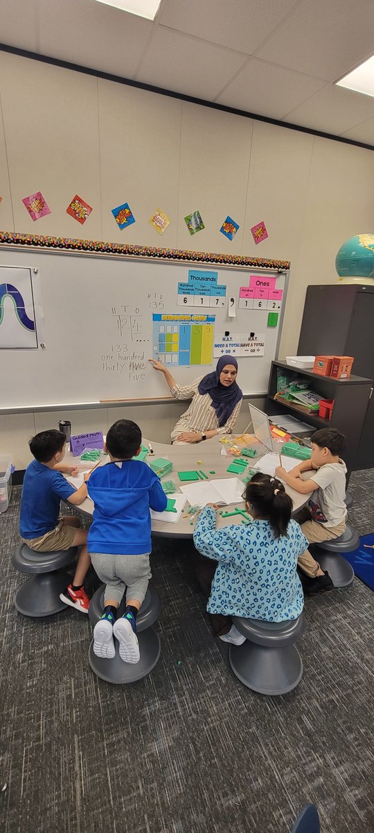 MrsE_Math_Queen's tweet photo. 2nd grade math teachers being intentional with their Guided Math groups while students in Learning Stations are helping each other while differentiated instruction can go uninterrupted. @TWE_Texans @Math_FBISD https://t.co/QDKg1OGfZL