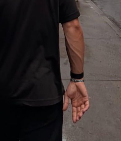 Meryam34945Zh's tweet photo. After noticing this person's reaction and smile... and how Deniz's hand was open waiting for Devrim's.. it seems they were sharing the most playful and sweetest moments together under the rain in NY..their love 🤏. 
#DenDev https://t.co/PJ5VHtnVrK