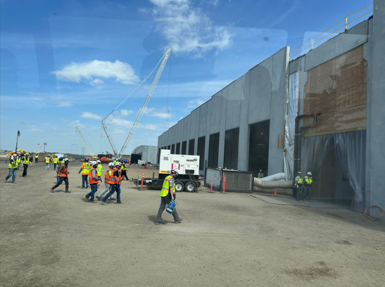 matthew_sigel's tweet photo. DISPATCH FROM NORTH DAKOTA -->

This week we visited Applied Digital's $APLD Polaris Forge 2 site in Harwood, ND and were very impressed by the sheer scale of the operation. Parking lot overflows, school bus shuttles across the campus and an endless sea of hardhats gave us a greater appreciation for what the company has constructed in just ~11 months.

Our day began with a company presentation and Q&A with management, where key topics included 1) the anticipation of higher yields and pricing on upcoming leases, with management guiding to 15-20% higher pricing on new deals, 2) the regulatory, power, and climate advantages of building in North Dakota, where sites may carry greater terminal value than Tier-1 markets given superior ability to scale and customer preference to co-locate training with inference, 3) the ~1.7GW of gross capacity currently being marketed, split between expansions with existing customers and potential new logos, and 4) management's belief that contract structure (SLA terms and caps), not initial headline yields/pricing, will determine realized returns over a 15-20 year lease.

From there we headed to the PF2 site, where we toured several data halls, viewed the backup power generation, and saw the substation under construction. Walking the site and speaking with the Campus Director left us with a few takeaways: 1) the company is prioritizing high-quality equipment from established US partners, and has scaled into a large enough buyer to place purchase orders well ahead of needs, 2) learnings from each data hall are being applied to the next room and future sites, which can accelerate deliveries and lower costs, and 3) the standardized base build creates a repeatable playbook the company can deploy across future developments, with customization limited to the tenant-specific requirements in the data hall.

Our Take: We think the market continues to undervalue the entire BTC to AI pivot cohort, ascribing little terminal value to signed leases and minimal credit to future pipeline, and APLD is a poster child. The company has already contracted 1.4GW of CITL with an expected base term lease value >$35B (up to $86B if all renewals are exercised), all planned for delivery by 2028 and to ~70% IG customers.

With only ~100MW operational today, APLD is in an execution window where construction delay risk may outweigh the upside from new lease announcements. However, walking the site and speaking with the team gave us confidence that the projects are tracking to plan and that management is building something repeatable, a platform that is capable of converting powered land into operating data center capacity at scale in a region where each incremental campus makes the next customer easier to land (management sees a path to 500MW of incremental deliveries annually through 2031). With >1.5GW currently being marketed, we expect proven execution to improve credit terms and free up equity at refinancing, grinding APLD's multiple higher as the company moves from a few individual assets into a compounding platform.

On the topic of rising "NIMBYism" against data centers across the US, APLD's relationship with its local communities stands out. Construction workers on site are earning six-figure incomes on average, materially lifting the surrounding economy through standing up new businesses, and management has been deliberate about reinvesting in the towns it operates in, funding schools, parades and local recreation (pickleball courts). At Ellendale, the tax base is going from ~$400K a year to nearly $4M, enough to fund schools and emergency services at a level the community could not previously contemplate, while drawing back residents who had left the area for work. In a sector where community opposition is a key risk to permitting and expansion, we view this goodwill as a real asset, and is one reason why management sees further runway to scale each of its existing campuses.

More to come in the next monthly.

H/T Griffin MacMaster