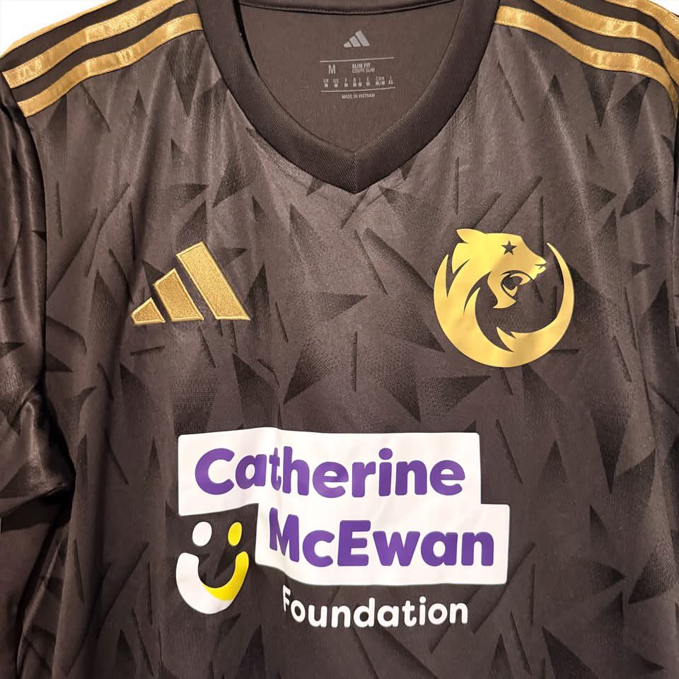 C_PumasAFC's tweet photo. As promised, our new kit launches today. Images below show our new Gold trim along with our new commemorative badge for working our way through grassroots football. 

We now play in the @spafaofficial 
HUGE THANKS to our club charity partner Catherine McEwan Foundation https://t.co/uujNzQg4gG